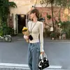 Camiseta blanca de manga larga con cuello redondo para mujer, camiseta básica ajustada para la moda de principios de otoño