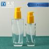 Venta directa botella de vidrio de fondo grueso con dispensador de 50 ml, 100 ml, cabezal de bomba amarillo, botella para aceite esencia de cuidado del cabello, portátil para viajes, sub-botella