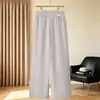 Calça reta estilo mãe de marca comercial de alta qualidade, novo estilo outono e inverno, calça versátil de perna estreita e larga para mulheres de meia-idade e idosas acima de 50 anos