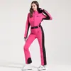 Nuevo traje de esquí de una pieza profesional para mujer para esquí al aire libre con doble tabla, a prueba de viento, cálido, impermeable, ajustado, alta elasticidad, traje de esquí transfronterizo para mujer