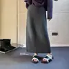 Falda de ganchillo calada de alta resistencia para mujer, nuevo estilo coreano otoño e invierno 2026, falda recta de felpa de alta gama de longitud media