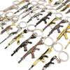 Varorant periférico intrépido contrato púrpura oro cuchillo garra hacha dorada fanático AK mini juguete llavero traje