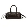 Bolso tipo baguette de alta gama con textura y estilo para llevar en la mano para mujer 2025 Otoño Nuevo Retro Lujo Accesible Bolso de Hombro Cruzado de Color Contrastante