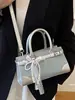 2026 Nova Bolsa de Mão Color Block Fashion Transfronteiriça para o Dia a Dia, Bolsa de Ombro Transversal de Nicho de Alto Padrão, Bolsa Quadrada Pequena para Mulheres