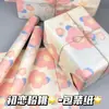 Una variedad de lindos papeles de regalo de dibujos animados para regalos navideños, materiales de embalaje para cajas de regalo, papel de regalo mixto de alta apariencia