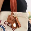 Colgante de Almacenamiento para Bolso Pequeño Estilo Coreano con Espejo Bolsa para Auriculares Llavero Colgante Bolso Mini de Piel Sintética Llavero