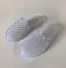 Pantuflas de gelatina de cristal para mujer, verano, antideslizantes, suela suave, para baño, uso doméstico, sandalias planas de plástico transparente, estilo de moda