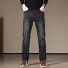 Jeans de Invierno Forrados de Polar Negro y Gris para Hombre 2026 Nueva Marca de Moda Pantalones Largos Elásticos Versátiles de Moda de Negocios