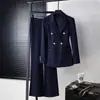 Elegante conjunto de traje negro de doble botonadura para mujer, atuendo profesional con pantalones ligeramente acampanados, conjunto de dos piezas para entrevistas y trabajo