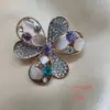 Broche de Alta Gama de Alta Gama Ojo de Gato Rosa Cisne Libélula Corsage Alfiler para Ropa Accesorios Venta al por Mayor