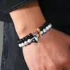 Venda quente transfronteiriça europeia e americana simples masculino e feminino casal pulseira de pedra natural preto e branco ímã casal amor pulseira conjunto