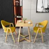 Mesa y sillas de reunión de estilo nórdico, moda italiana, lujo ligero; mesa de recepción y negociación de negocios de alta gama, mesa de ocio para patio