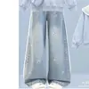 Nova coleção de primavera e outono: moletom estiloso com gola marinha e calça jeans doce com laço, um conjunto de duas peças em estilo preppy para meninas