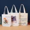 Bolsa de mão de algodão Desenho animado Impressão colorida de desenho animado Sacola de compras portátil para carregar na mão Sacola de lona dobrável Sacola de lona para estudante para aula