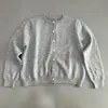 Cárdigan de punto redondo estilo perezoso de lunares, nueva colección de otoño, suéter abrigo adelgazante y suave para mujer, camisa minimalista de botones