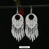 Brincos de borla de prata Miao artesanais estilo étnico vintage temperamento feminino Yunnan Miao personalidade estágio brincos longos versáteis