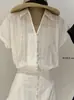WGWE10036 Guangzhou Treze Linhas Roupas Femininas Verão 2026 Novo Vestido Francês de Gola V com Design Acinturado e Manga Curta