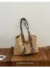 Bolso retro de gamuza de gran capacidad para mujer, estilo nuevo 2026, bolso de hombro de nicho, bolso de mano y bolsa de compras, moderno