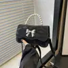 Bolsa de laço de design de nicho feminina 2024 nova pérola de alta qualidade portátil pequena bolsa quadrada bolsa de ombro crossbody bolsa moderna