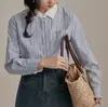 Camisa de Listras Verticais Azuis Feminina Outono 2024 Retrô Francês Gola Polo Manga Longa Top