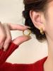 Aretes año del dragón retro lujo ligero patrón de dragón enrollado hebilla de oreja diseño de nicho aretes de temperamento único aretes de moda y tendencia
