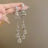 Aretes de Estilo Exótico de Venta Caliente Retro Literario Clásico Dignificado Ganchos para la Oreja Versátil Hueco Moda Borla Colgantes