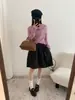 Saia midi estilo vintage, tecido escovado, estampa floral, corte A, evasê, cintura alta, casual, versátil e que afina a silhueta para mulheres, perfeita para o outono.
