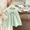 ¡Pudín de Leche Melón Ningli! Vestido de tirantes hueco con lunares, estilo vacacional súper lindo para niñas pequeñas, 2026