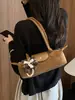Bolsa baguette de camurça vintage de alta qualidade para mulheres, nova bolsa de ombro/axila de moda de nicho 2026, bolsa de mão para o dia a dia