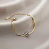 Pulsera de acero de titanio Jin Hui no se decolora cruzada popular femenina trébol de cinco hojas diamante estilo Ins personalidad chapado al vacío 18K