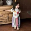 Conjunto para Niñas 2026 Primavera Nuevo Elegante Estampado de Dibujos Animados para Niños Top de Manga Corta y Pantalones Anchos de Bloques de Color para Bebés