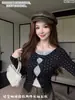 Camiseta Negra con Lazo Falso de Dos Piezas Manga Larga para Mujer Primavera 2026 Corte Ajustado Capa Interior Diseño de Encaje Patchwork Top