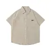 Camisa de manga corta a rayas suelta casual estilo retro ciudad para hombre Nanxia Qiaozhuang 2026 Verano