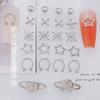 Estilo Punk Japonés Arte de Uñas Aleación Universo Planeta Hueco Estrella de Cinco Puntas Forma de Arroz Accesorios Metálicos para Uñas Joyería Más Vendida