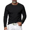 Camiseta básica de manga larga de color liso con cuello redondo para hombre, de estilo transfronterizo para otoño, corte holgado casual, top interior versátil para hombre