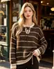 Nuevo suéter de punto a rayas de otoño europeo y americano para mujer, estilo casual versátil holgado, diseño de cuello redondo, top de manga larga