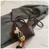 Bolso Cubo de Textura Tejida Simple 2026 Nuevo Estilo Bolso Diseño de Nicho Bolso de Mano Moda Color Sólido Informal Bolso de Hombro