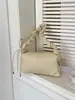Bolso de Mano Pequeño de Alta Gama Transfronterizo para Mujer, Nuevo Bolso Versátil de Hombro o Axila Primavera 2026, Popular Bolso Tote Cruzado