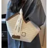 Bolso de paja transfronterizo de gran capacidad para mujer, nuevo bolso de hombro versátil para la playa 2026, bolso tote para vacaciones en la playa y uso diario
