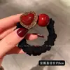 Estilo coreano combina com tudo Faixa de cabelo vermelha em formato de coração e tripa pequena feminina Rede social Bola de amarrar para coque rabo de cavalo Corda de cabelo 2023 novo adorno de cabeça