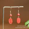 Aretes Colgante de Cinabrio de Alto Contenido Mineral Crudo Cabeza de Buda Arena Imperial Aretes de Sentido Avanzado Accesorios de Aretes Hechos a Mano