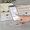 Soporte de escritorio para teléfono móvil creativo para dormitorio de网红 decoración decorativa acrílica soporte plano transparente para teléfono móvil de estudiante