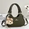 Bolso de mano tipo bolsa de dumplings nuevo y elegante de alta apariencia, bolso de hombro o axila versión coreana, bolso cruzado para mujer, bolso para mujer