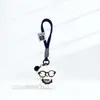 Colgante de Peluche Lindo Cachorro con Gafas Correa para Bolso Muñeco Adorno Regalo de Navidad Llavero Correa para el Cuello