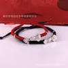Pulsera de cuerda trenzada Ruyi de Plata 999 estilo cuerda roja creativa pulsera tejida para el cumpleaños del año de la pareja