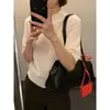 Top de punto MMC de lana con cuello alto y manga corta, colección otoño 2026, diseño simple, suave y favorecedor, manga tres cuartos, 63M61137