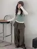 Conjunto de otoño para niña 2026 nuevo estilo: top de punto tipo camisola con falda acampanada y pantalones de pierna ancha, conjunto infantil en capas estilo coreano