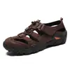 Sandalias para Hombre de Verano Nuevas Transpirables para Exteriores Baotou Zapatos de Playa Huecos Agujeros para Conducir Zapatos para Vadear Hombres