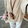 Bata Transparente Estilo Perezoso Color Avena con Protección Solar Conjunto de Dos Piezas para Mujer Primavera Temprana 2026 Camiseta sin Mangas Versátil Anti-Exposición