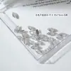 Diamante de Circonia Rosa con Base Plana para Arte de Uñas Modelo Transfronterizo de Cruz Caja de 12 Compartimentos Joyería Brillante de Circonia Rosa Claro de Tamaño Mediano para Uñas